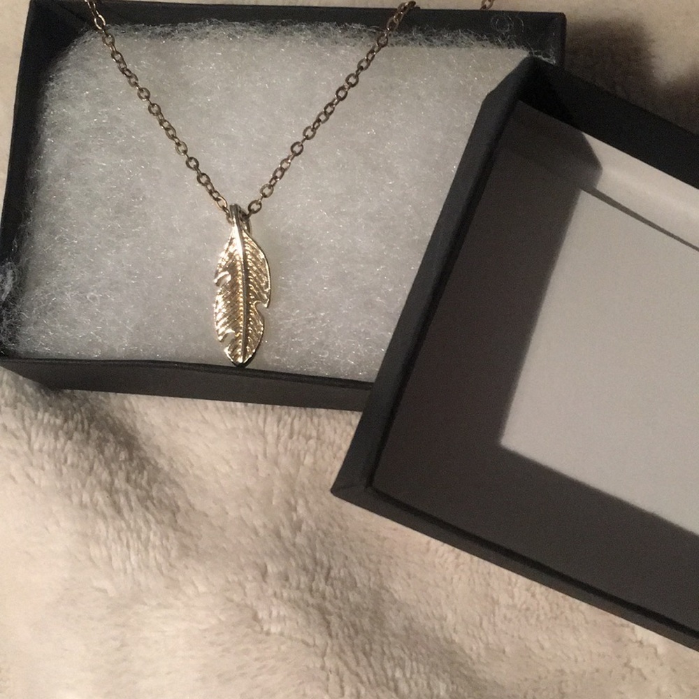 Gold feather necklace